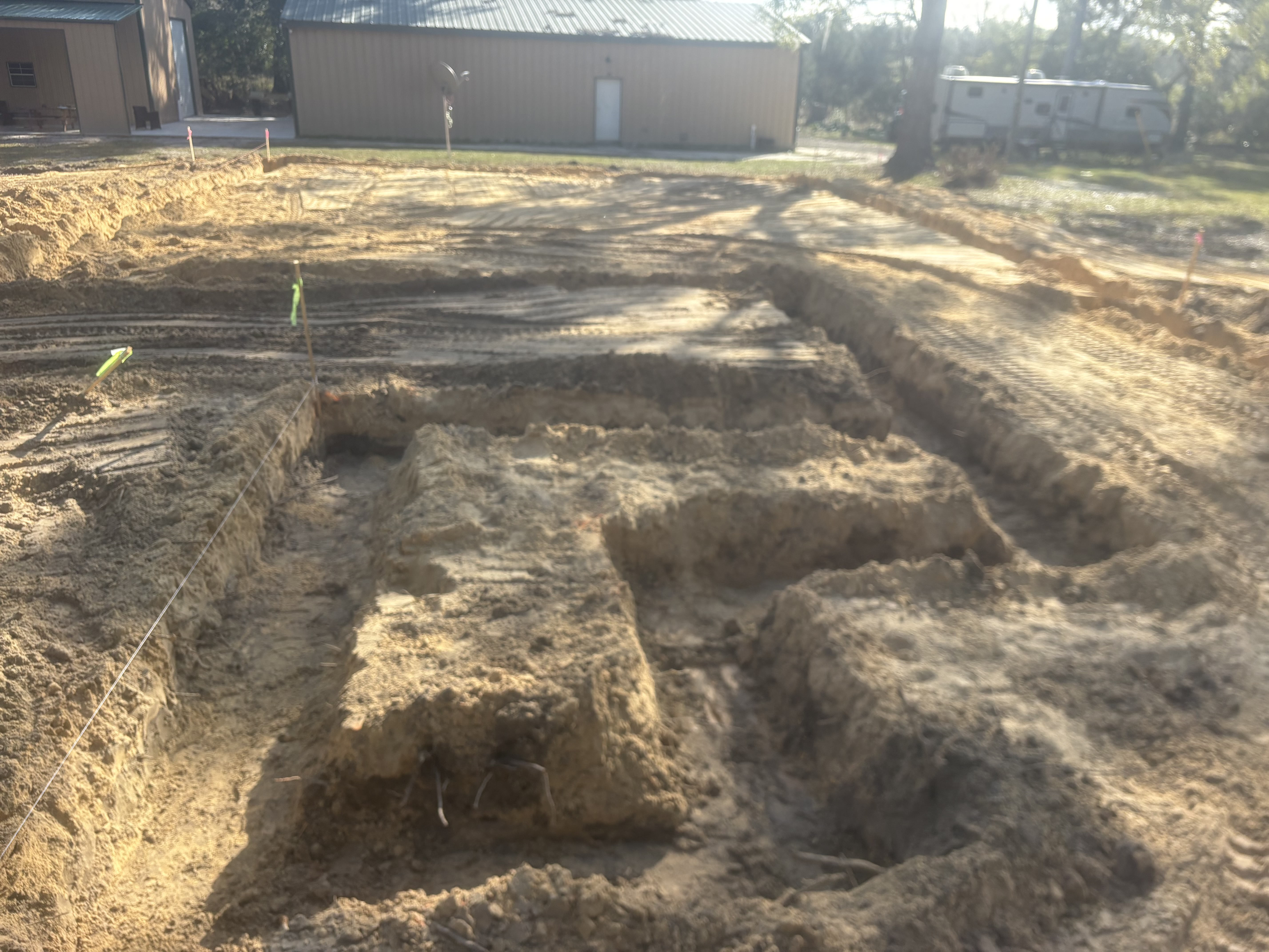 Excavation and grading for a clean site preparation